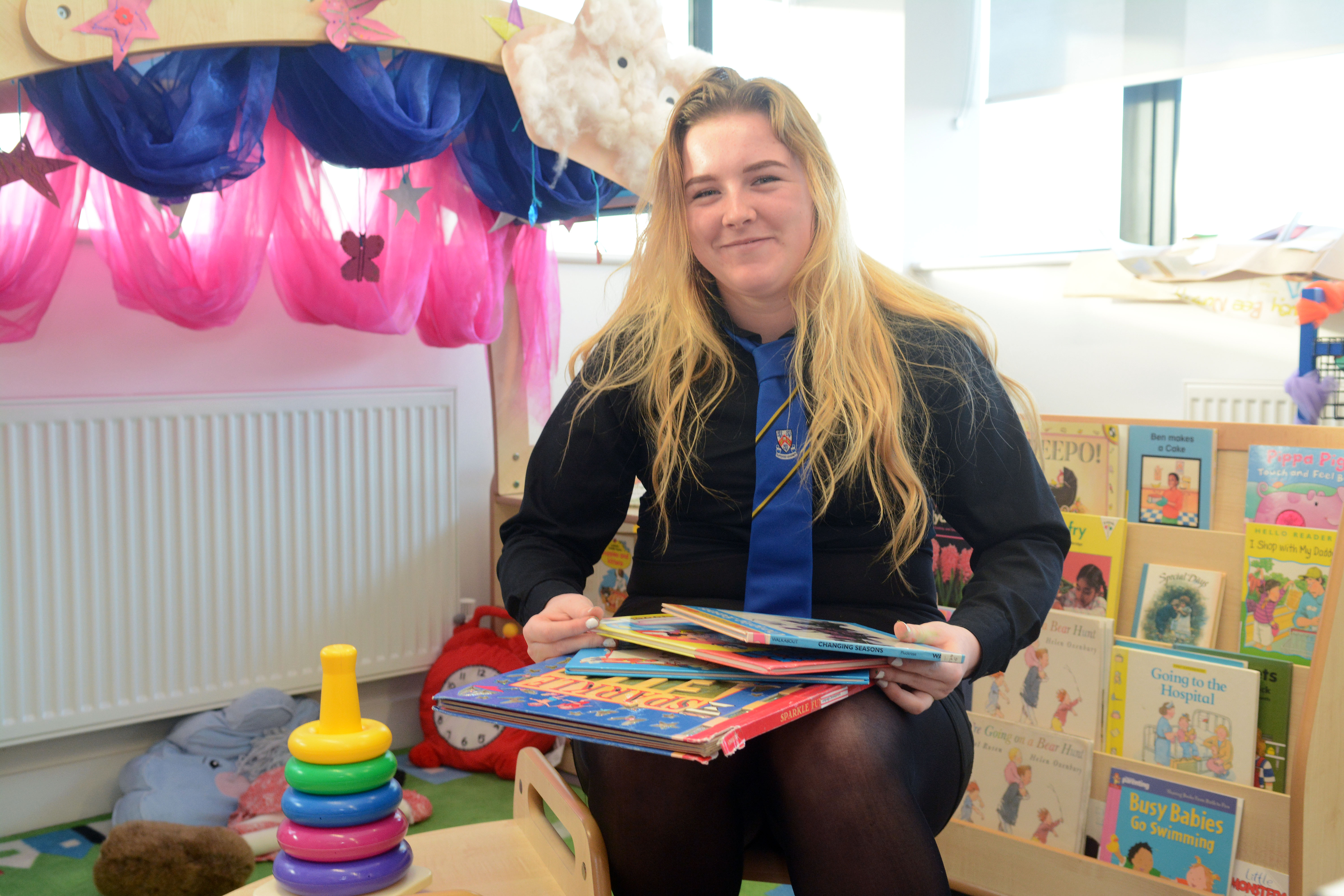 Lets talk foundation apprenticeships for Scottish Apprenticeship Week 2019.girl with books.jpg